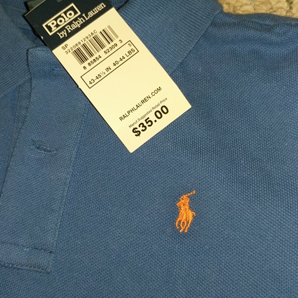 Boys royal blue pique Polo in size 5